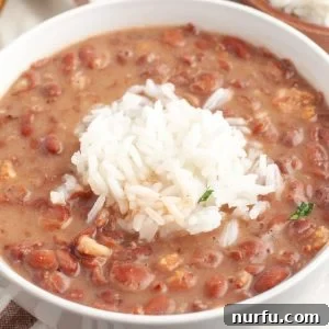 Restaurant-Style Popeyes Red Beans and Rice At Home 6 Bowl of beans and rice.