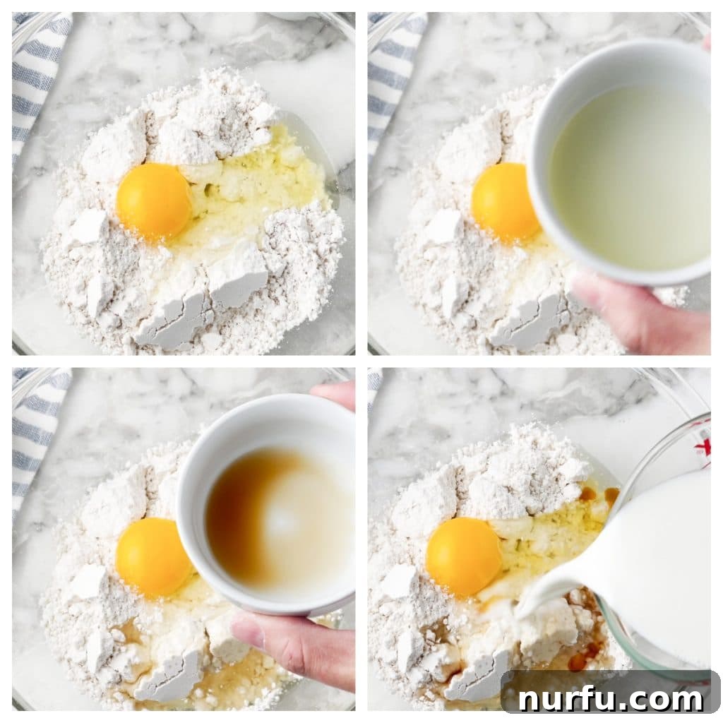 Fluffy Bisquick Waffles Made Easy 4 A mixing bowl filled with Bisquick flour, milk, a cracked egg, and vegetable oil, before being stirred into a waffle batter.