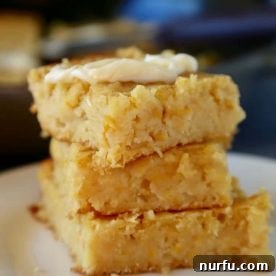 Mexican Sweet Corn Cake, Pan de Elote, served on a plate.