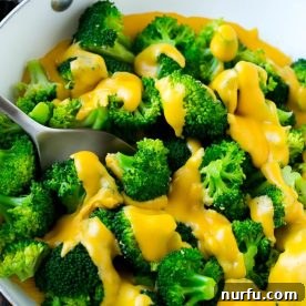 Broccoli with cheese sauce.