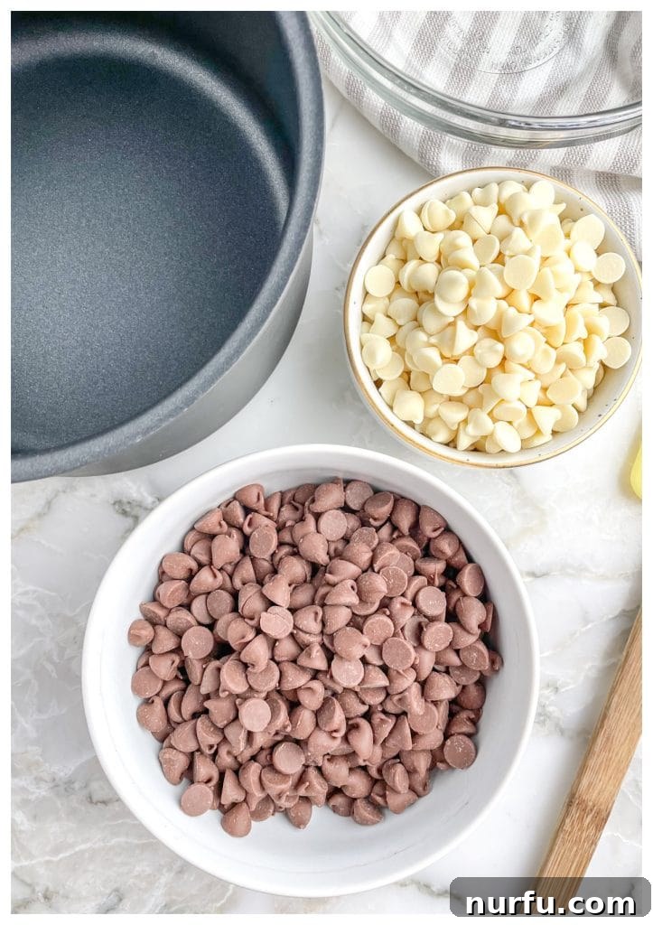 Mastering Melted Chocolate: 3 Simple Techniques 3 Bowls of chocolate chips and white chocolate chips.