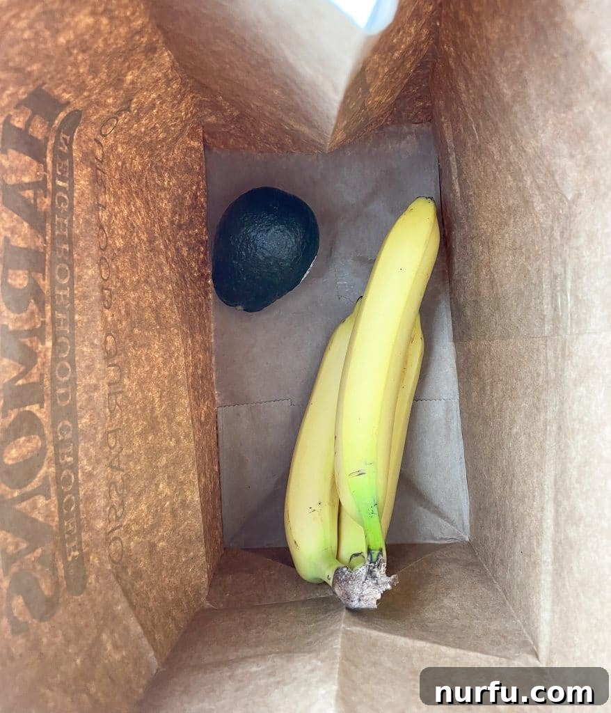 Four Simple Methods to Ripen Bananas Fast 5 Unripe bananas and an avocado in a brown paper bag to ripen faster.
