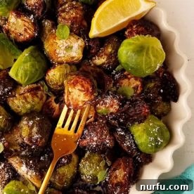 Crispy Brussels sprouts in the air fryer, seasoned and ready to eat.
