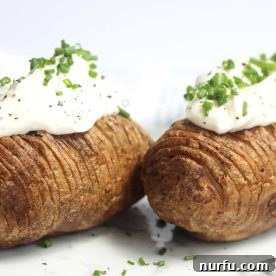 Beautifully prepared air fryer hasselback potatoes with crispy, seasoned edges.