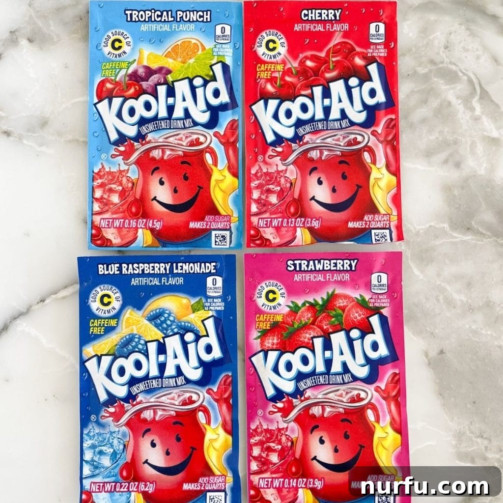 Two Kool-Aid packets displayed: Tropical Punch and Cherry flavors, highlighting classic choices.