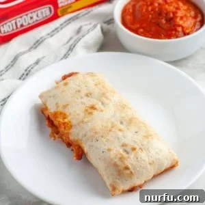 Cooked hot pocket on a plate.