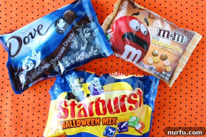 Delicious Halloween Candy Selection Various bags of delicious Halloween candy, perfect for filling DIY ghost jars.
