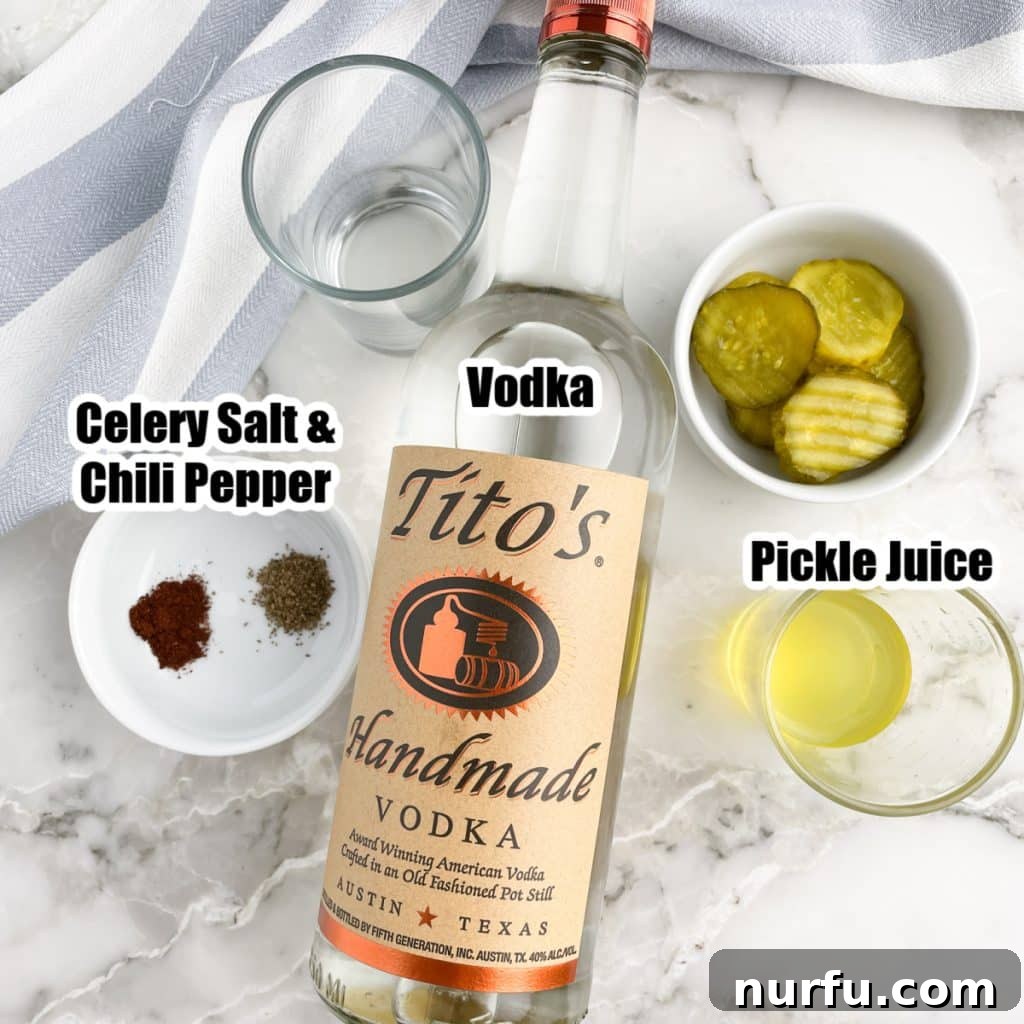 Bottle of vodka, bowl of celery salt and chili powder, bowl of pickles and pickle juice for shot preparation.