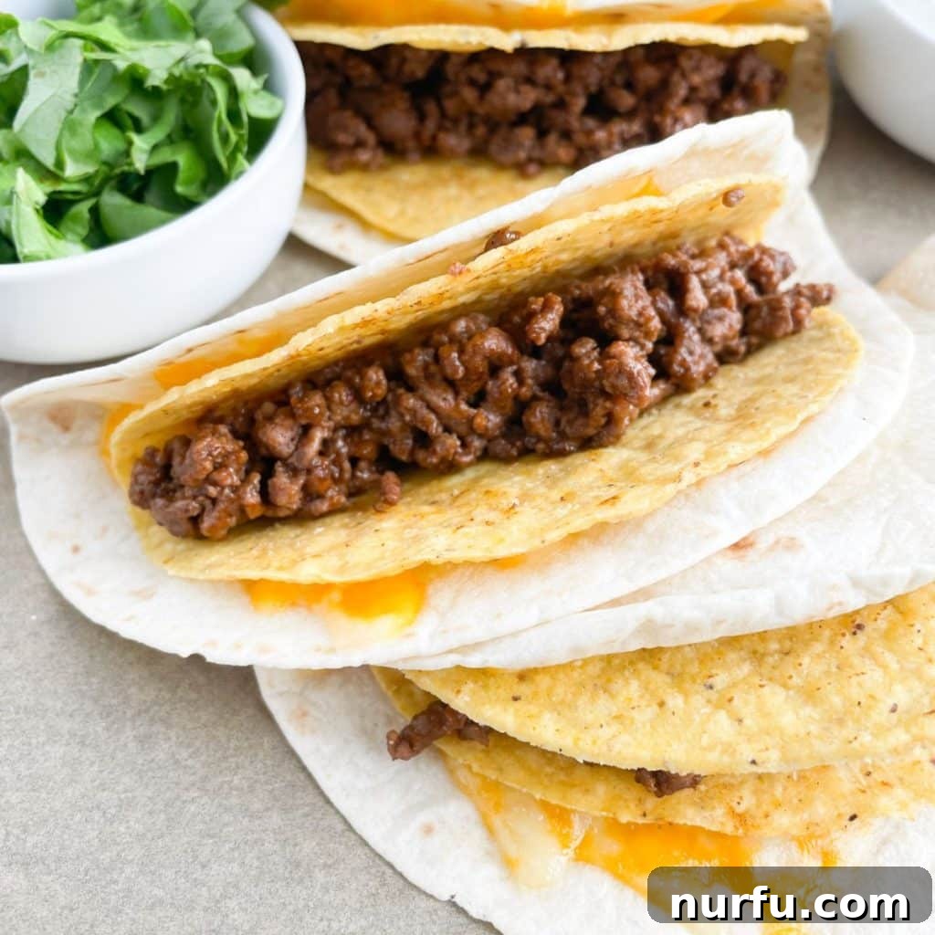Ultimate Homemade Cheesy Gordita Crunch 7 Flour tortilla and taco shell filled with ground beef.