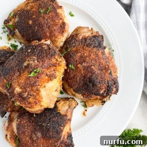 Get Juiciest Chicken Thighs The 350 Degree Bake Time Revealed 8 A plate of chicken thighs.