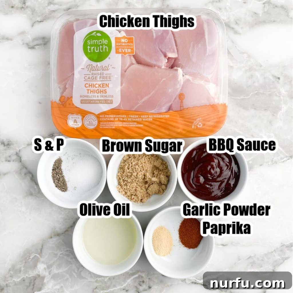 Sticky BBQ Chicken Thighs 3 An array of ingredients for baked BBQ chicken, including raw chicken thighs, a bowl of spices, a bottle of BBQ sauce, and olive oil.