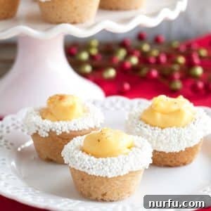 Spiced Eggnog Cookie Cups 3 Three cookie cups on a plate.