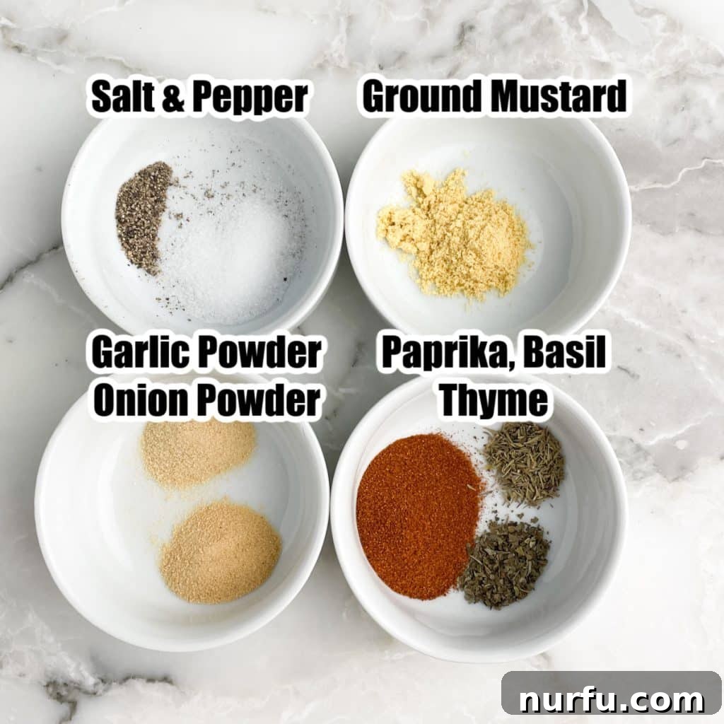 Homemade Meatloaf Spice Blend 3 Close-up of various meatloaf seasoning ingredients in separate small bowls, including salt, pepper, ground mustard, garlic powder, onion powder, paprika, and thyme.