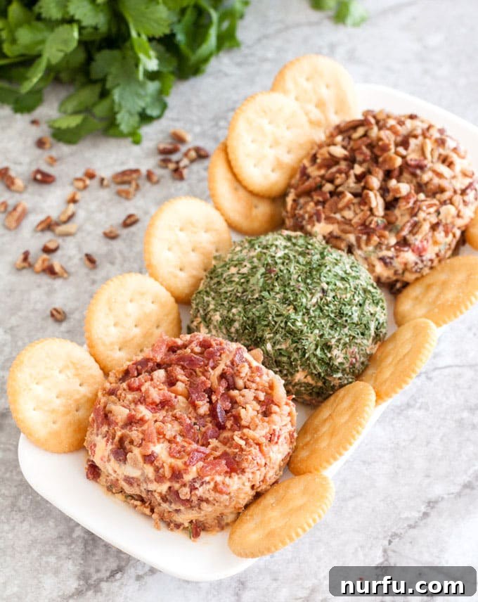 Ultimate Pimento Cheese Ball 4 pimento cheese balls on a plate