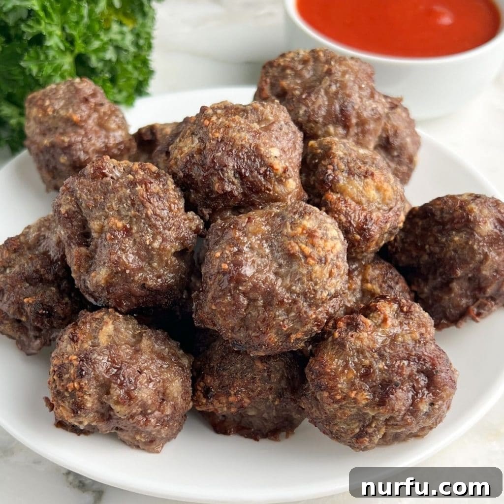 21 Perfect Sides for Your Mac and Cheese 4 Cooked meatballs on a plate.