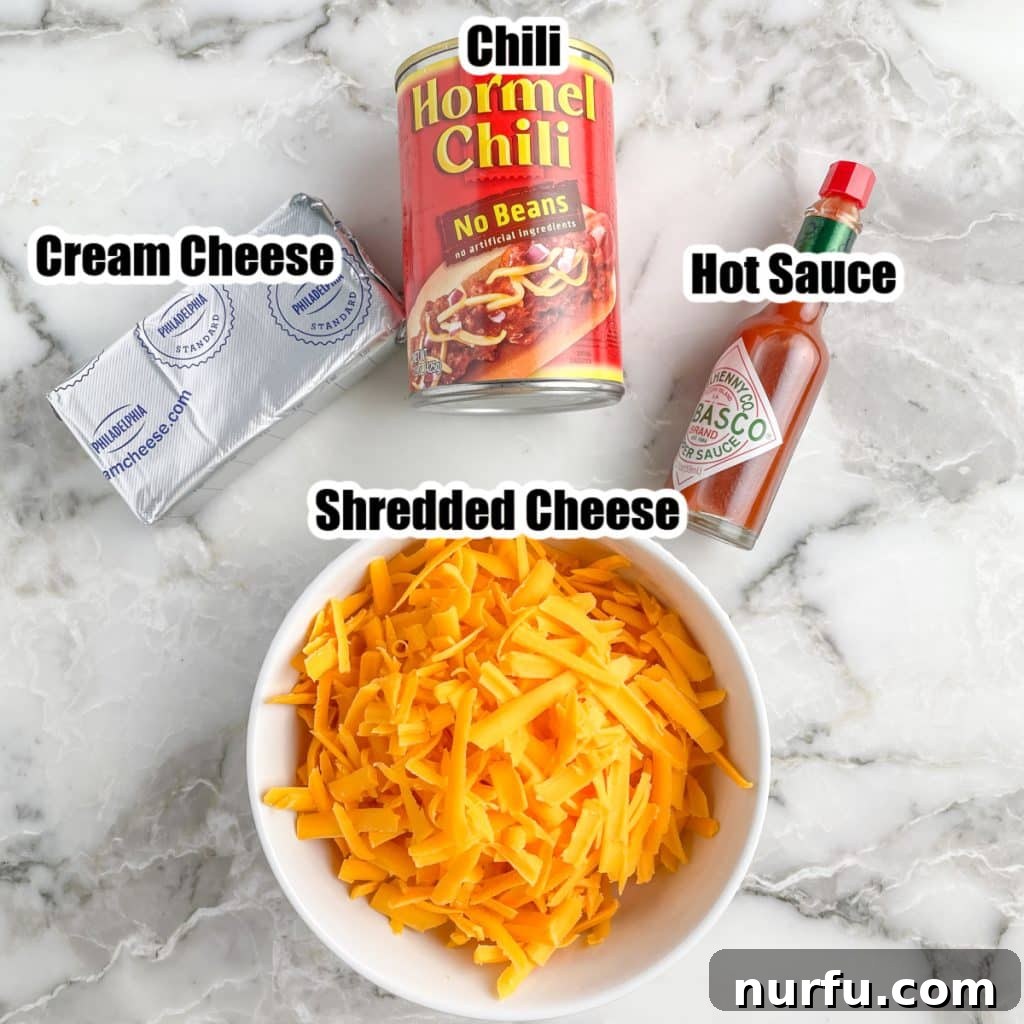 Spicy Cheese Dream 3 Can of chili, cream cheese, hot sauce, and bowl of shredded cheese.