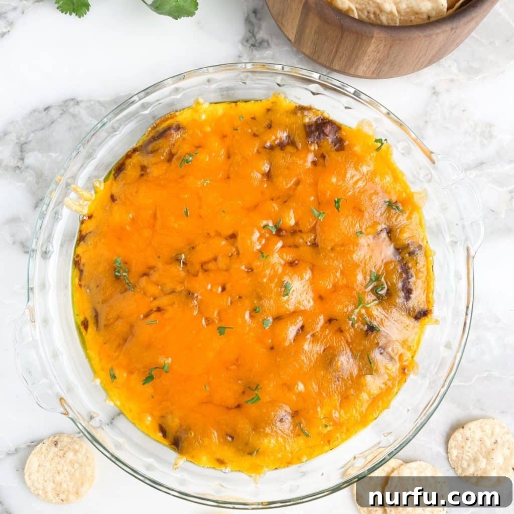 Spicy Cheese Dream 7 Pie plate with a cheesy dip.
