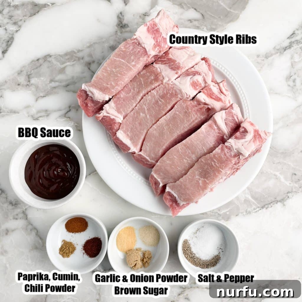Tender Slow Cooker Country Ribs 3 Ribs, bowl of BBQ sauce, and bowl of spices laid out on a kitchen counter.