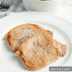 Thin pork chops on a plate.