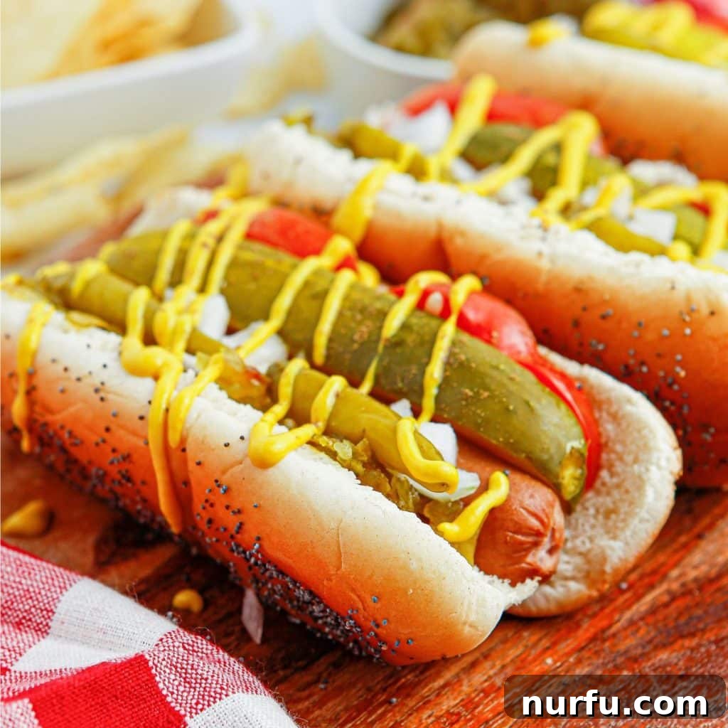 Mastering the Authentic Chicago Hot Dog 6 An assembled Chicago style hot dog, adorned with a dill pickle spear, tomato wedges, sport peppers, yellow mustard, and green relish, all topped with celery salt.