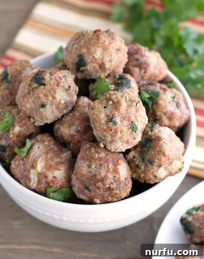 Close-up of baked Turkey Quinoa Spinach Meatballs, highlighting their healthy, protein-packed goodness and inviting texture.