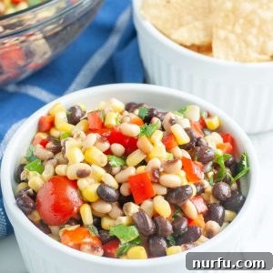 Bowl full of corn and bean salad.