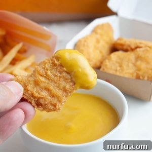 Chicken nugget with mustard sauce.