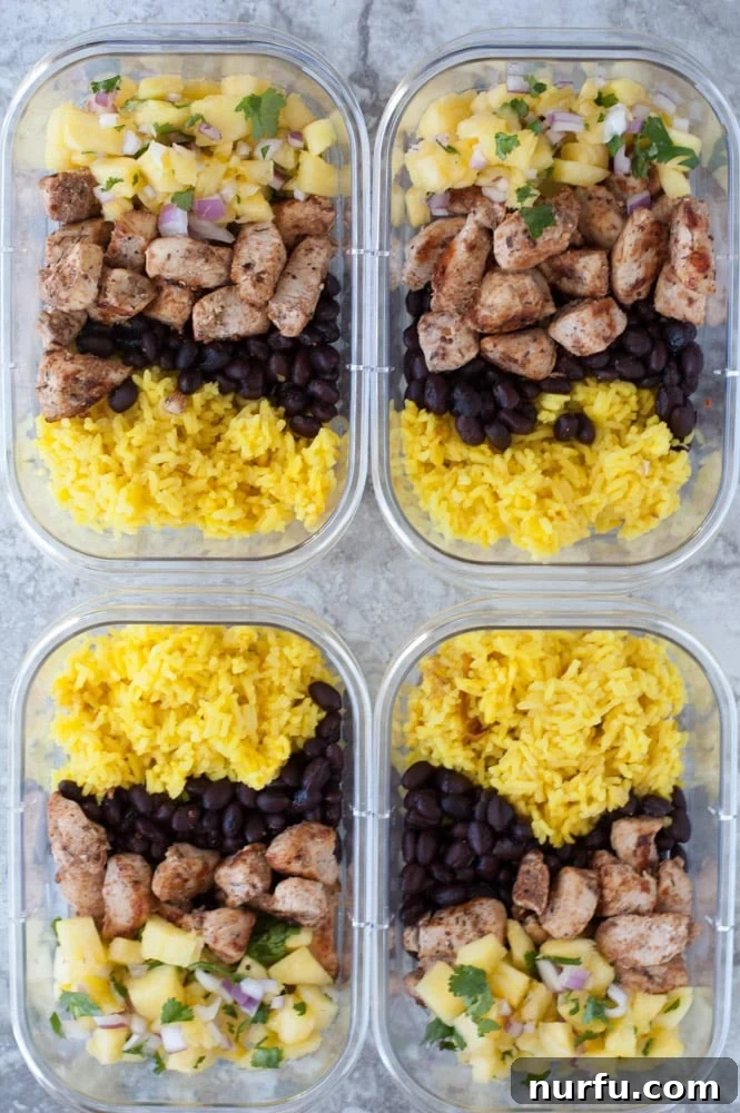 Prepared Meal Prep bowls for the week Two finished Jerk Chicken Meal Prep Bowls ready for storage.