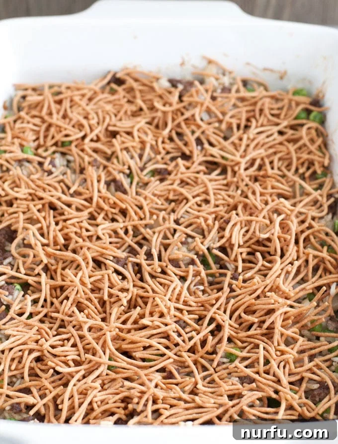 Asian Beef and Rice Casserole with crispy chow mein noodles visible