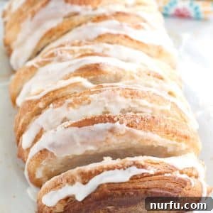 Pull apart bread on a table with lemons.