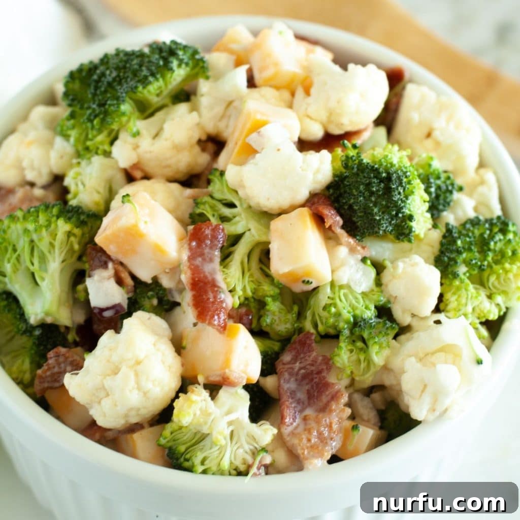 Savory Bacon and Garden Florets Salad 3 A close-up shot of the finished Broccoli Cauliflower Salad, perfectly dressed and ready to be enjoyed, showing the delicious coating on each ingredient.