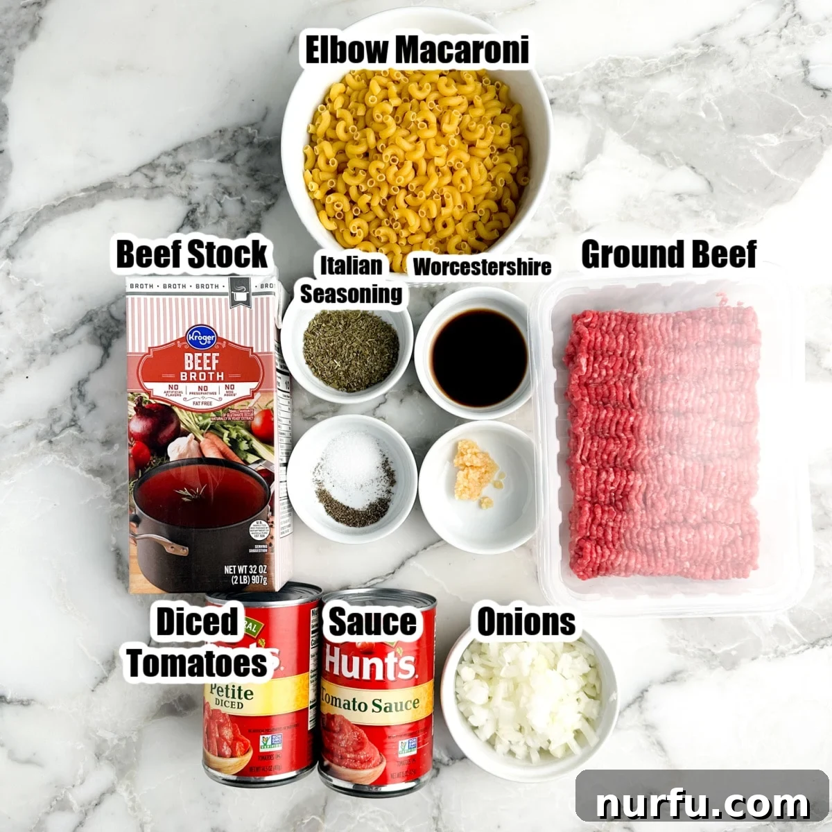 Hearty Slumgullion America's Beloved Goulash 3 Individual ingredients laid out for Slumgullion, including ground beef, elbow macaroni, canned tomatoes, beef broth, onion, and garlic, ready for preparation.