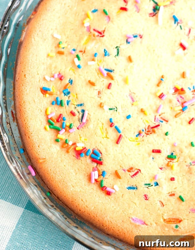 A top-down view of the Bisquick box, highlighting its versatility as a key ingredient in countless easy recipes, including this delightful Funfetti Cheesecake, promising quick and delicious results for home bakers.
