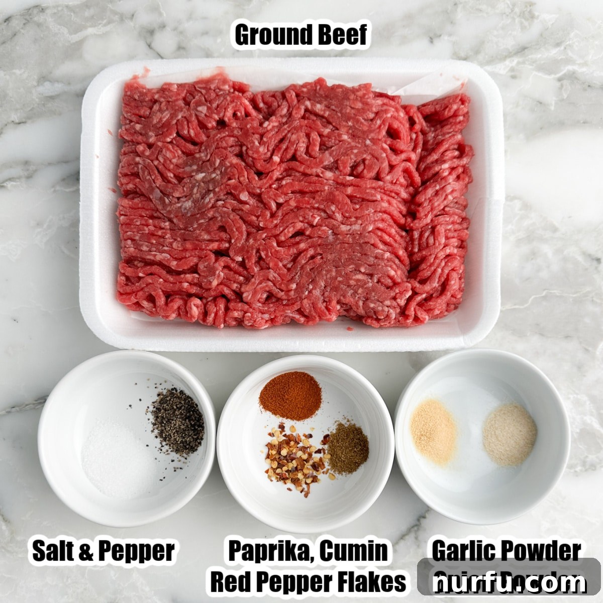 Seasoning Secrets for Ground Beef 3 Bowls filled with individual spices like salt, ground black pepper, garlic powder, onion powder, paprika, and ground cumin, carefully arranged next to uncooked ground beef.