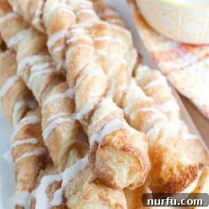 Cinnamon puff pastry twists on a plate.