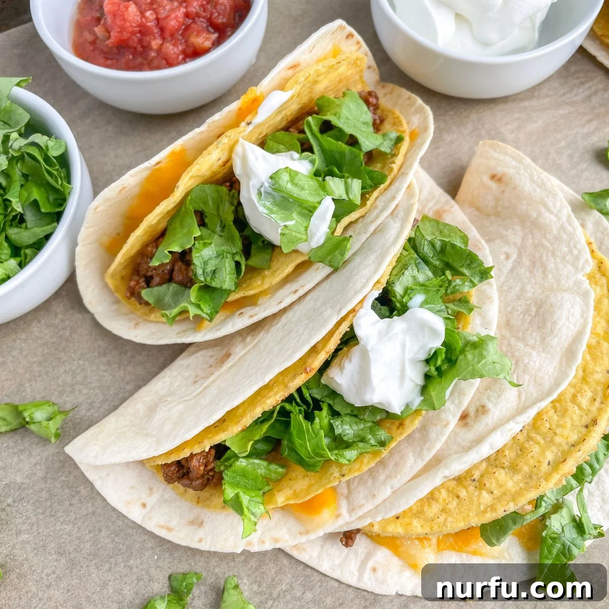 31 Effortless Friday Feasts for a Relaxing Night In 11 Three gorditas and bowl of salsa and sour cream.