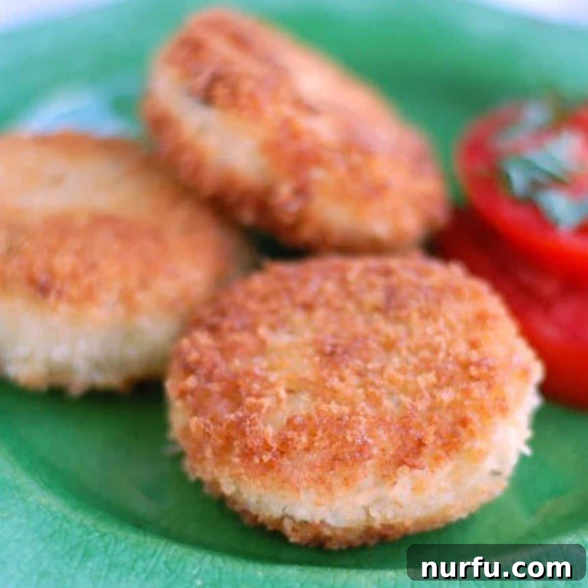 31 Effortless Friday Feasts for a Relaxing Night In 23 Green plate with chicken croquettes.