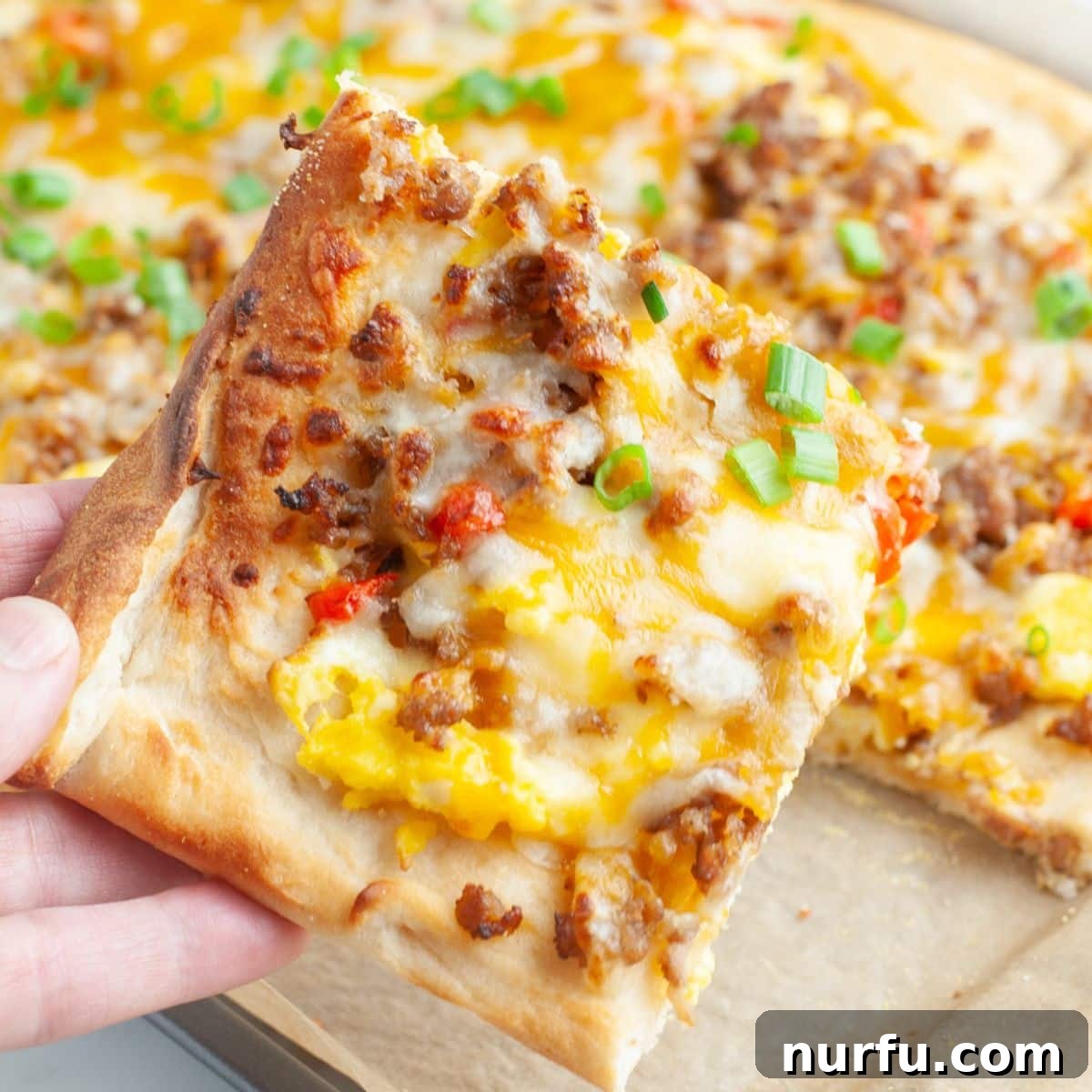 31 Effortless Friday Feasts for a Relaxing Night In 27 Piece of breakfast pizza.