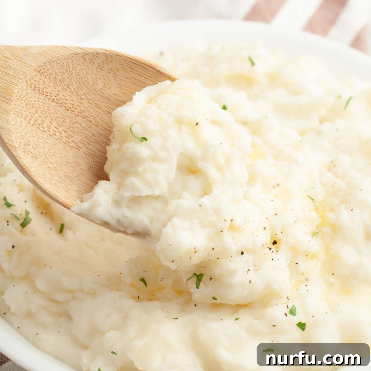 Perfect Pairings for Your Chicken Wings 6 Wooden spoon with mashed potatoes.