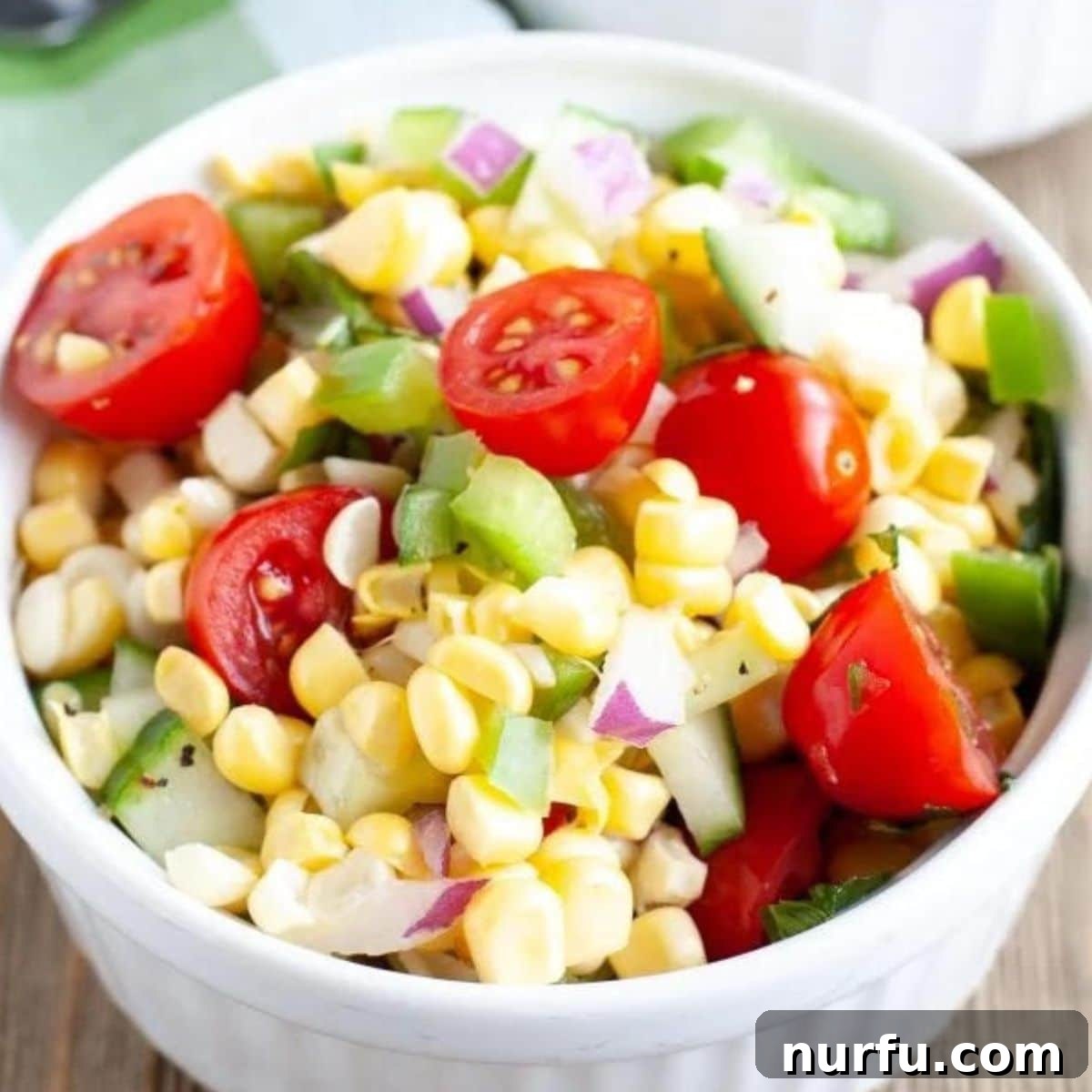 Perfect Pairings for Your Chicken Wings 9 Bowl with corn and tomato salad.