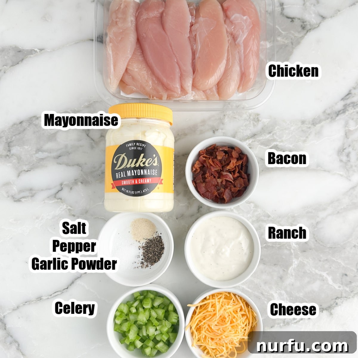 Homemade Sassy Scotty Chicken Salad 3 Key ingredients laid out: chicken tenderloins, creamy mayonnaise, crispy chopped bacon, finely diced celery, rich shredded cheese, and a blend of essential seasonings, ready to be combined into the Sassy Scotty chicken salad.
