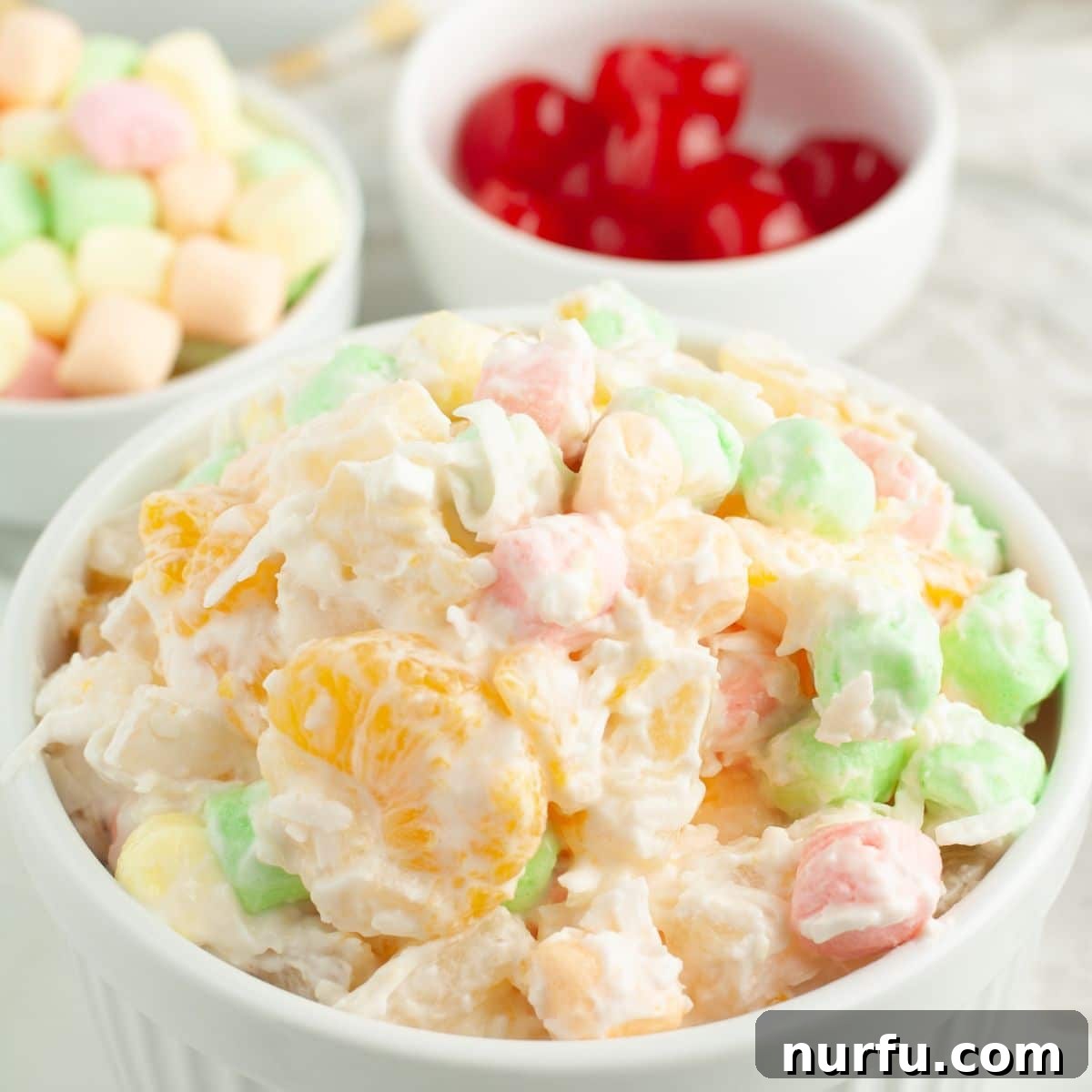 Perfect Sides for Chicken Salad 10 Bowl of fruit salad with colorful marshmallows.