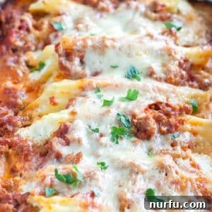 Filled pasta with cheese and sausage, a rich and hearty Italian dish.