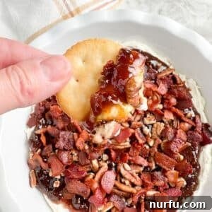 Fig & Bacon Boursin Bliss 9 Cracker with creamy Boursin, fig jam, bacon, and pecan dip.