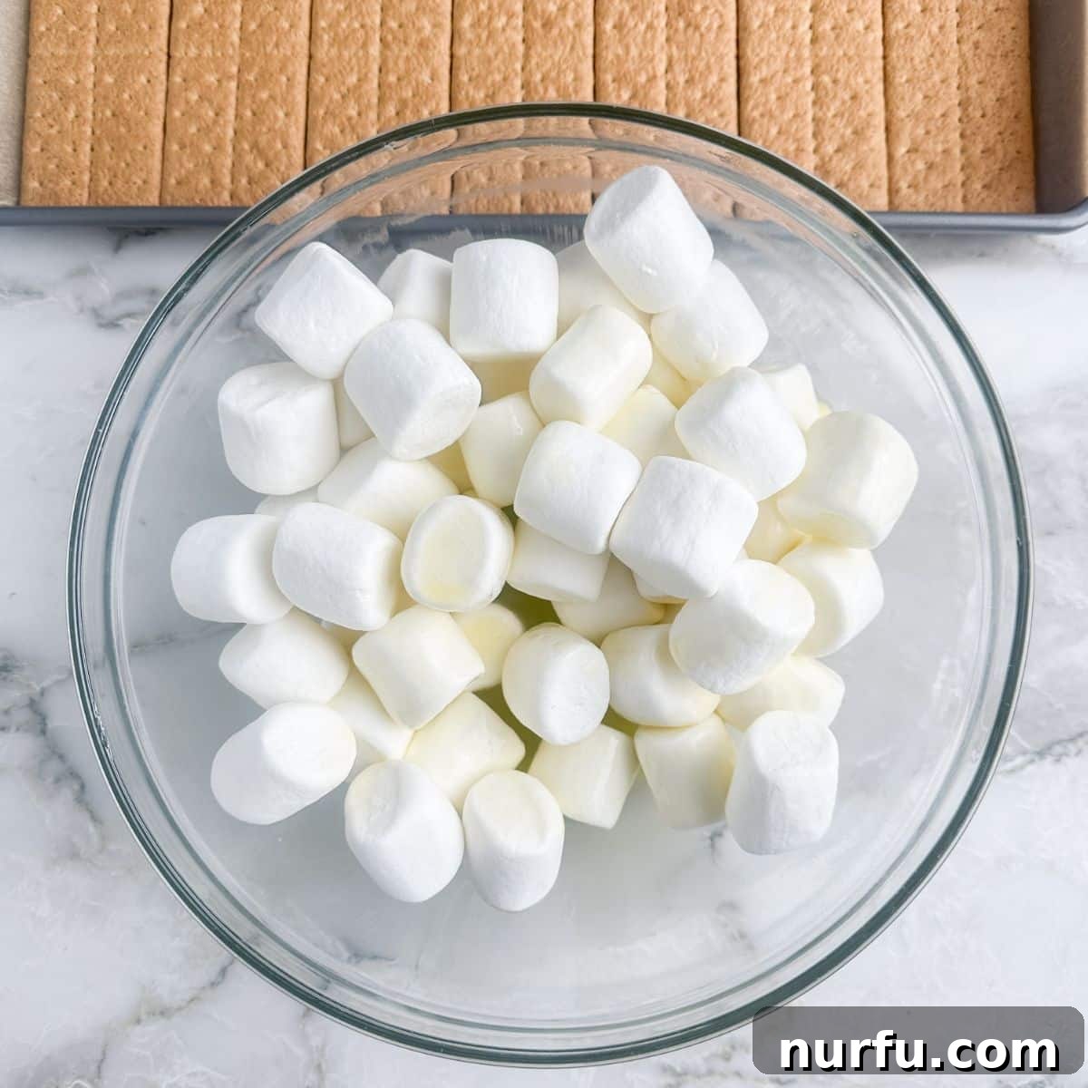 Irresistible S'mores Bark 4 A bowl of marshmallows ready for melting.