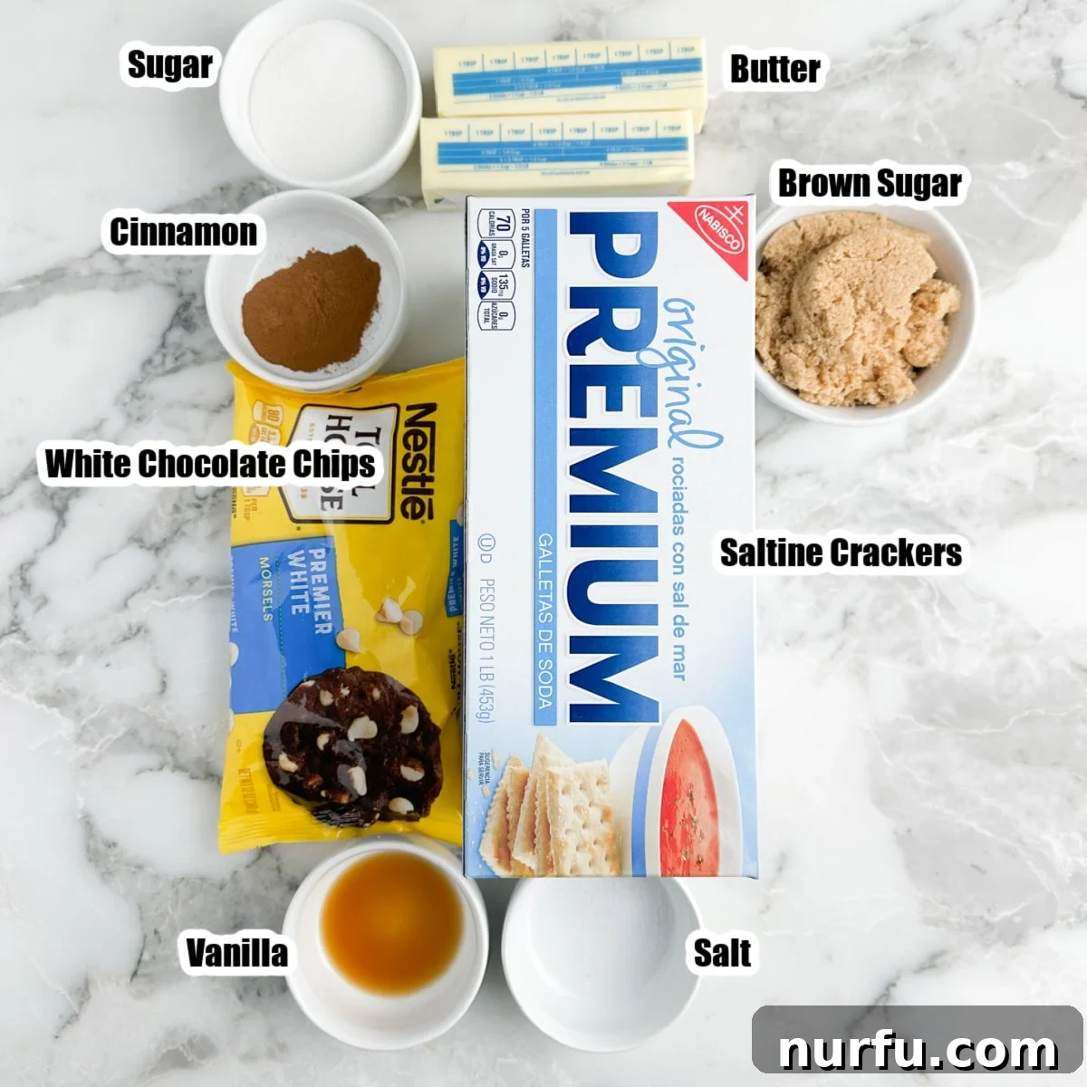 Cinnamon Caramel Saltines 3 Box of crackers, white chocolate chips, bowls of sugar, brown sugar, butter, and cinnamon laid out on a table.