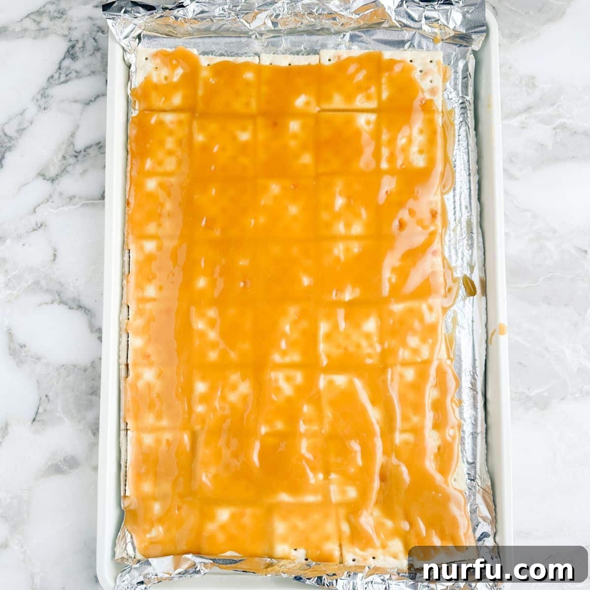 Cinnamon Caramel Saltines 7 Crackers covered with hot, golden toffee.