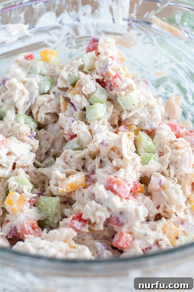Healthy meal prep recipes - Chicken salad mixture in a glass bowl