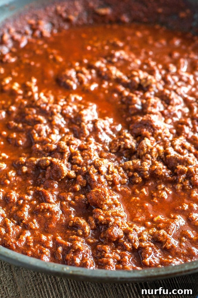 Sloppy Joe Meat in Skillet Ground beef and sloppy joe mix in a skillet