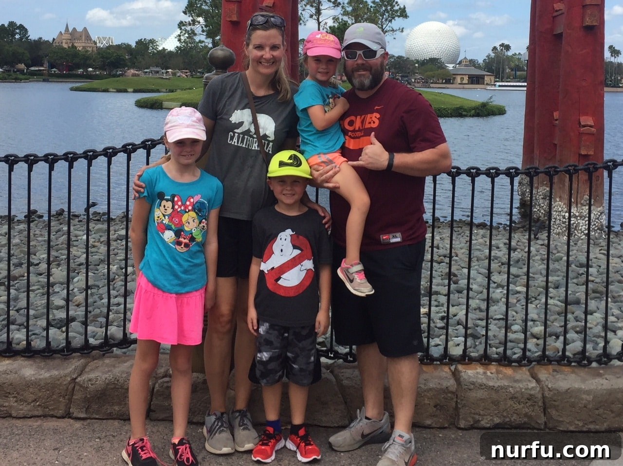 Disney Dreams on a Dime 4 A family standing together happily in Disney World.